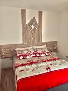 Postel nebo postele na pokoji v ubytování Locanda monte cervino