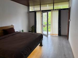 Vuode tai vuoteita majoituspaikassa Skyvue resorts