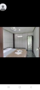 Postel nebo postele na pokoji v ubytování Sunset bar bungalows