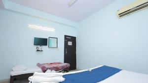 TV a/nebo společenská místnost v ubytování Hotel NoVo Agra - Near Taj Mahal