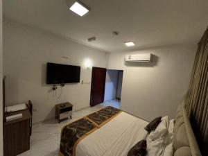 Postel nebo postele na pokoji v ubytování Star Suites