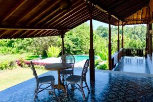 Balkón nebo terasa v ubytování Hideaway House Bali