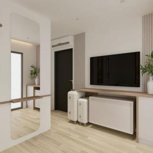 TV a/nebo společenská místnost v ubytování Hotel by Jon