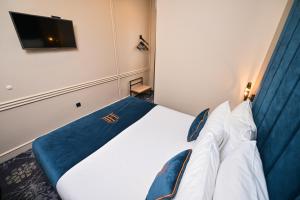 Postel nebo postele na pokoji v ubytování Hotel Ideja