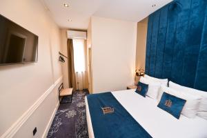 Postel nebo postele na pokoji v ubytování Hotel Ideja