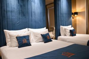 Postel nebo postele na pokoji v ubytování Hotel Ideja