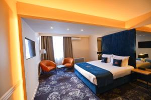 Postel nebo postele na pokoji v ubytování Hotel Ideja