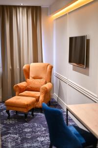 TV a/nebo společenská místnost v ubytování Hotel Ideja