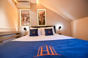 Postel nebo postele na pokoji v ubytování Hotel Ideja