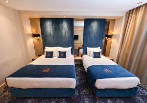 Postel nebo postele na pokoji v ubytování Hotel Ideja