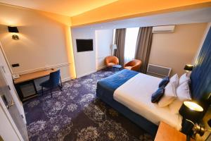 TV a/nebo společenská místnost v ubytování Hotel Ideja
