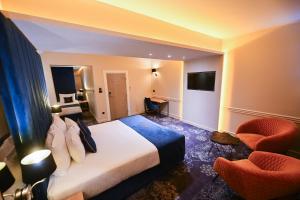 TV a/nebo společenská místnost v ubytování Hotel Ideja