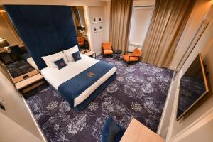 Postel nebo postele na pokoji v ubytování Hotel Ideja