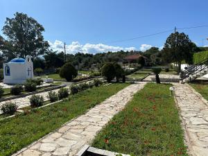 Κήπος έξω από το Villa Evita