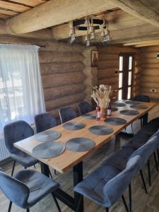 Posezení v ubytování Cabana dintre brazi Mărișel