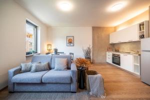 Kuchyň nebo kuchyňský kout v ubytování Aurora - The City Center Apartment