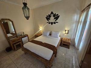 Postel nebo postele na pokoji v ubytování Hotel Chonos