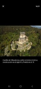 an aerial view of a building in a forest at El pisito de iker in Mondariz