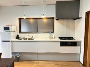 Cucina o angolo cottura di 民宿NaMi