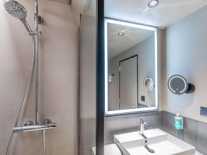 Ванная комната в Novotel Setubal