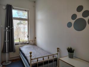 Postel nebo postele na pokoji v ubytování Nygård