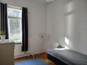 Postel nebo postele na pokoji v ubytování Nygård