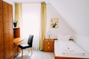 Postel nebo postele na pokoji v ubytování Hotel Brandaris