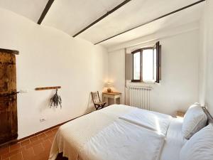 Postel nebo postele na pokoji v ubytování Casa Bozzo, appartement 'Stalla'