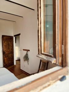 Postel nebo postele na pokoji v ubytování Casa Bozzo, appartement 'Stalla'