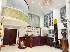 a large room with a large chandelier at Hong Tam Hotel in Ho Chi Minh City