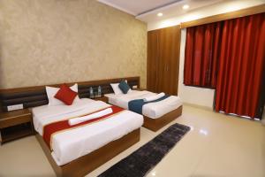 Postel nebo postele na pokoji v ubytování Hotel Luxe Stay Near Delhi Airport