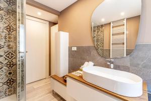 Koupelna v ubytování Isolino Bridge apartment by Houset