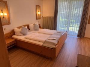 Postel nebo postele na pokoji v ubytování Hotel Restaurant Adler Stube