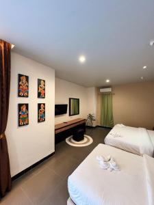 Μια τηλεόραση ή/και κέντρο ψυχαγωγίας στο Hotel Ompu Herti