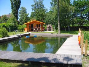 Zahrada ubytování Christianshus Ferienhaus Vareler Hafen + 21 fotografií