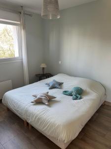 Postel nebo postele na pokoji v ubytování Le paradis