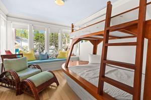 a room with a bunk bed and a chair at WaterColor Escape in Santa Rosa Beach +58 photos