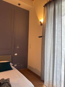 Postel nebo postele na pokoji v ubytování Muradelle B&B