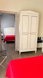 Postel nebo postele na pokoji v ubytování Notti sull'Adige