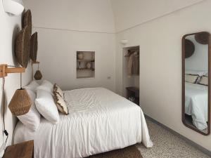 Postel nebo postele na pokoji v ubytování Dimora Pinto