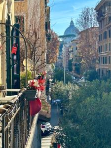 a balcony with a view of a city with a building at Big Johnny B in Rome