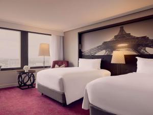 Voodi või voodid majutusasutuse Sofitel Brisbane Central toas