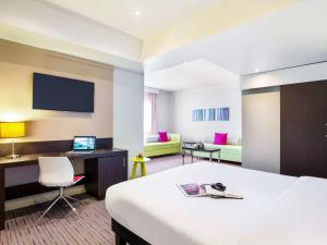 A television and/or entertainment centre at ibis Styles Sharjah