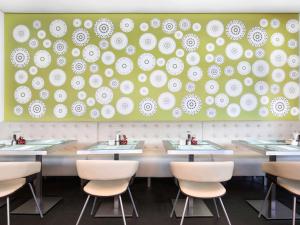A restaurant or other place to eat at ibis Styles Sharjah
