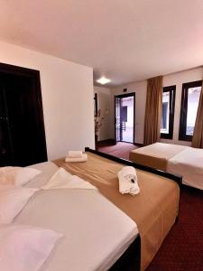 En eller flere senge i et værelse på Complex Tropical + 10 billeder