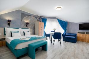 TV a/nebo společenská místnost v ubytování Gasthaus Panzió + 30 fotografií