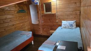 A bed or beds in a room at Olga's Home
