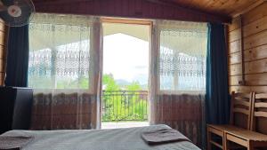 A bed or beds in a room at Olga's Home
