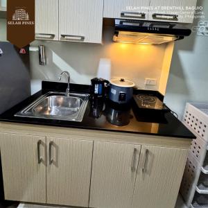 Kuchyň nebo kuchyňský kout v ubytování Selah Pines at Brenthill Baguio