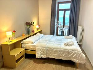 Postel nebo postele na pokoji v ubytování Hotel Pietralba